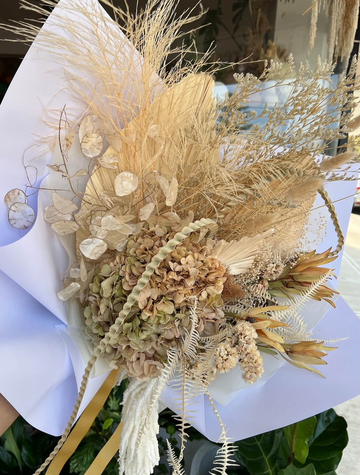 Everlasting bouquet of dried and preserved flowers in warm natural tones by Lime Tree Bower Florist Sydney