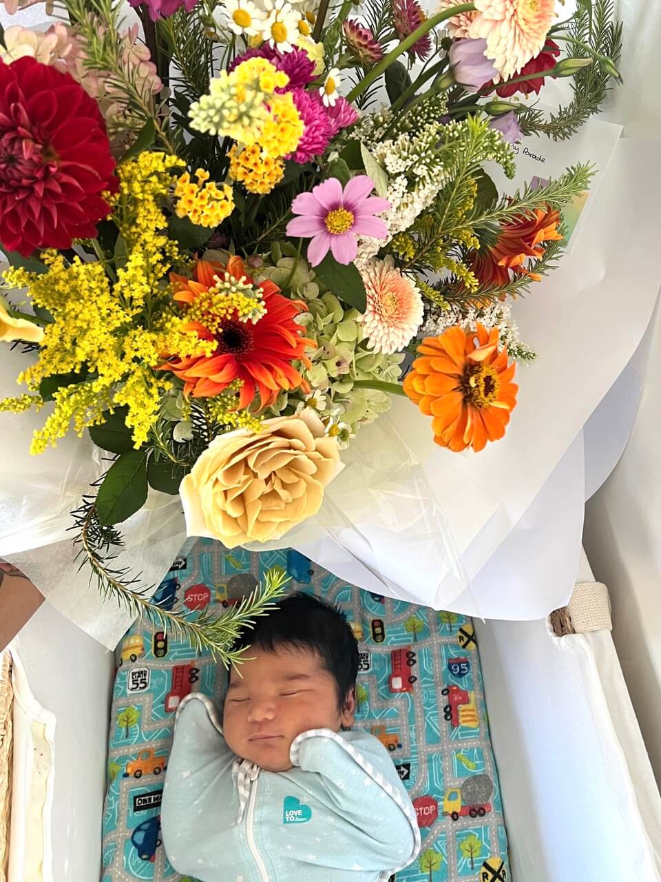 newborn baby congratulations mum flowers with baby