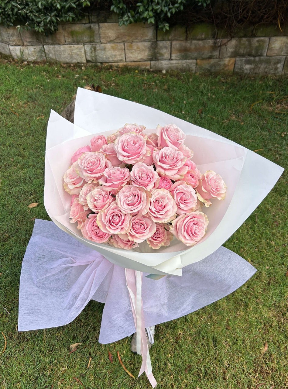 pink luxury roses wrapped bouquet for delivery
