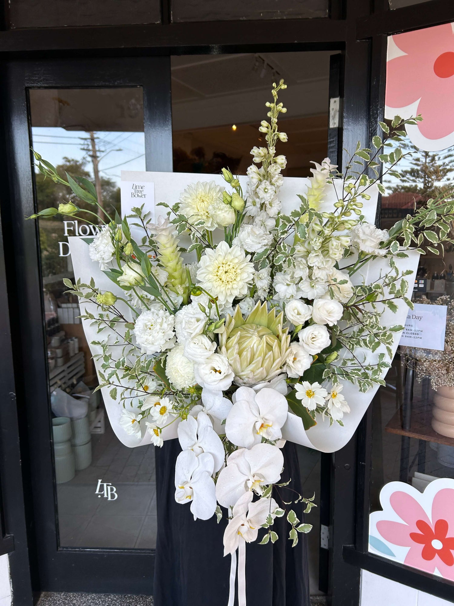 white luxury bouquet flower delivery with orchids