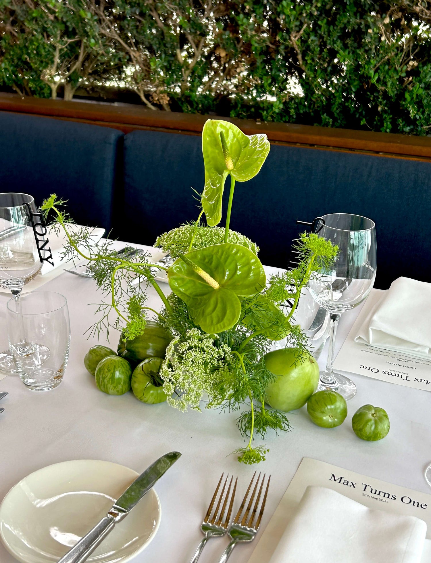 green anthurium flower with fruit styling table arrangement